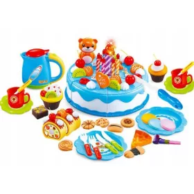    Teáskészlet édességekkel, csészékkel és tányérokkal