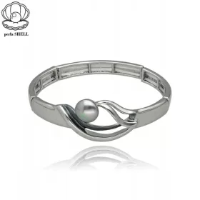    Ezüst karikás karkötő díszítőelemmel és kagylógyönggyel