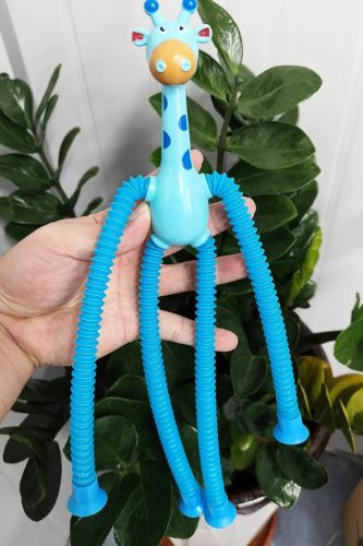  Új Cartoon Animal Giraffe Led Magic Sensory Stretch Plastic Suction Pop Tu